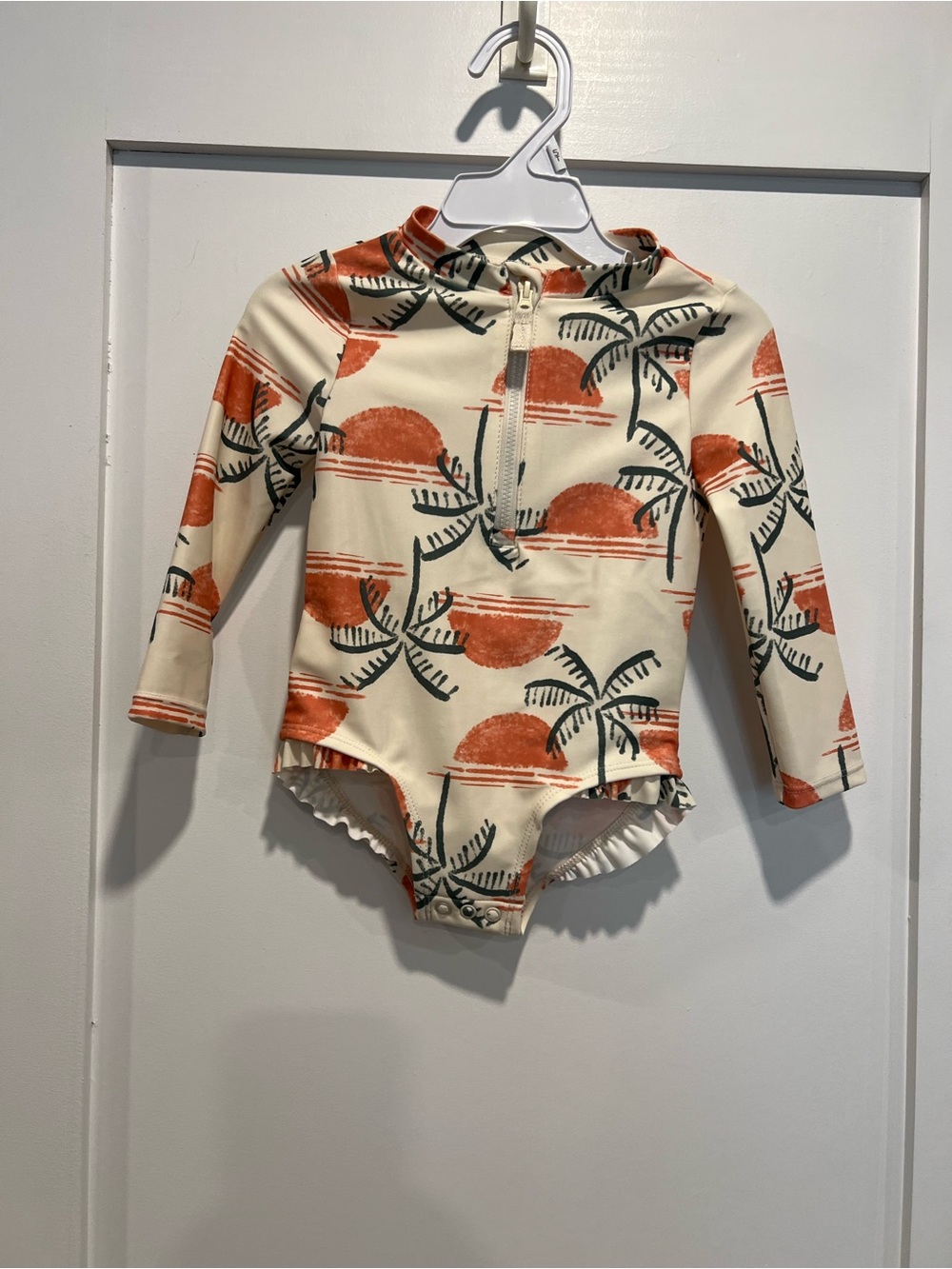 Kids Long-Sleeve One-Piece Rash Guard Swimsuit - Cream with Orange Palm Print